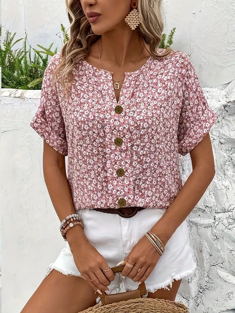 Relaxed fit women's ditsy floral short sleeve blouse, a stylish button-front summer top for everyday wear.