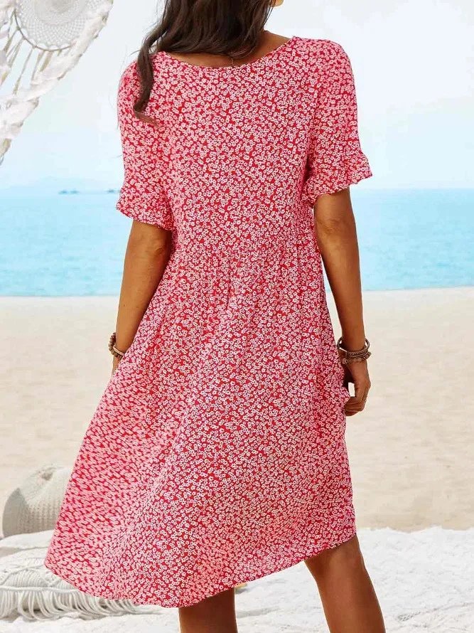 Stylish women's ditsy floral A-line mini dress with flutter sleeves, ideal for spring events or holidays.