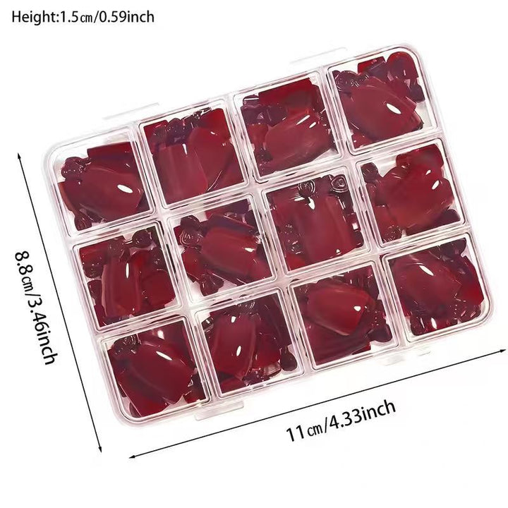 Assortment of elegant nail stickers & decals, including wine red patterns, from women's DIY nail art beauty kit.