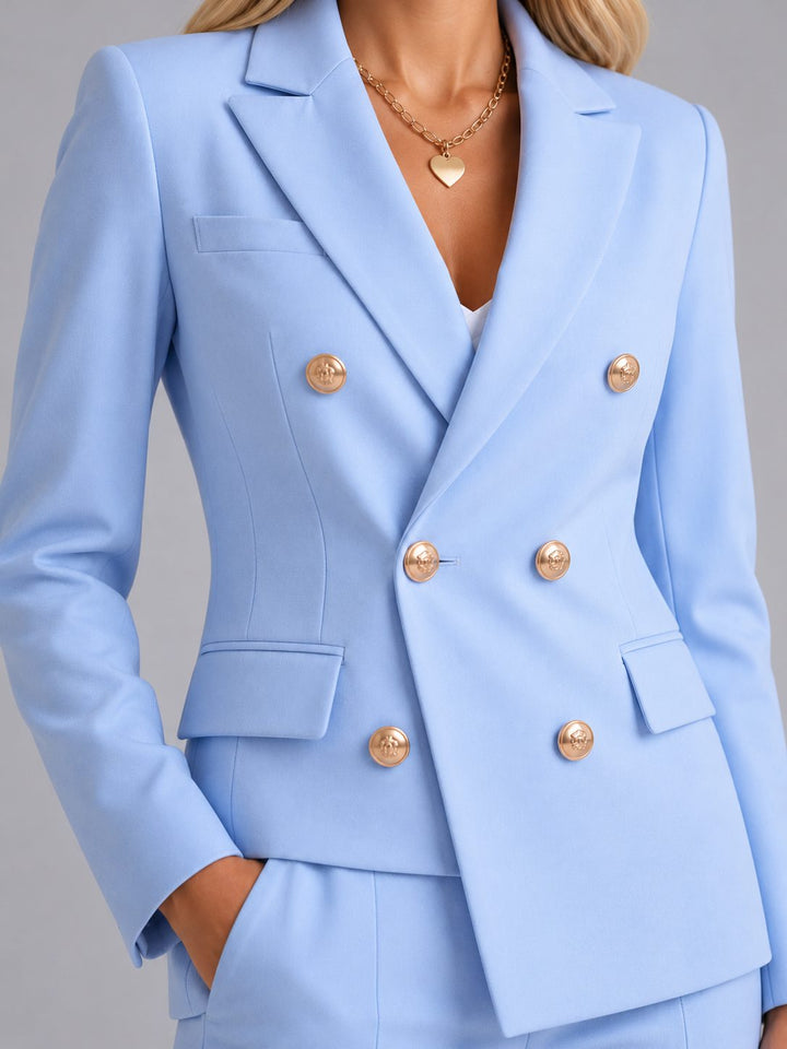 Chic double-breasted tailored blazer and matching trousers for women. Ideal professional business attire.