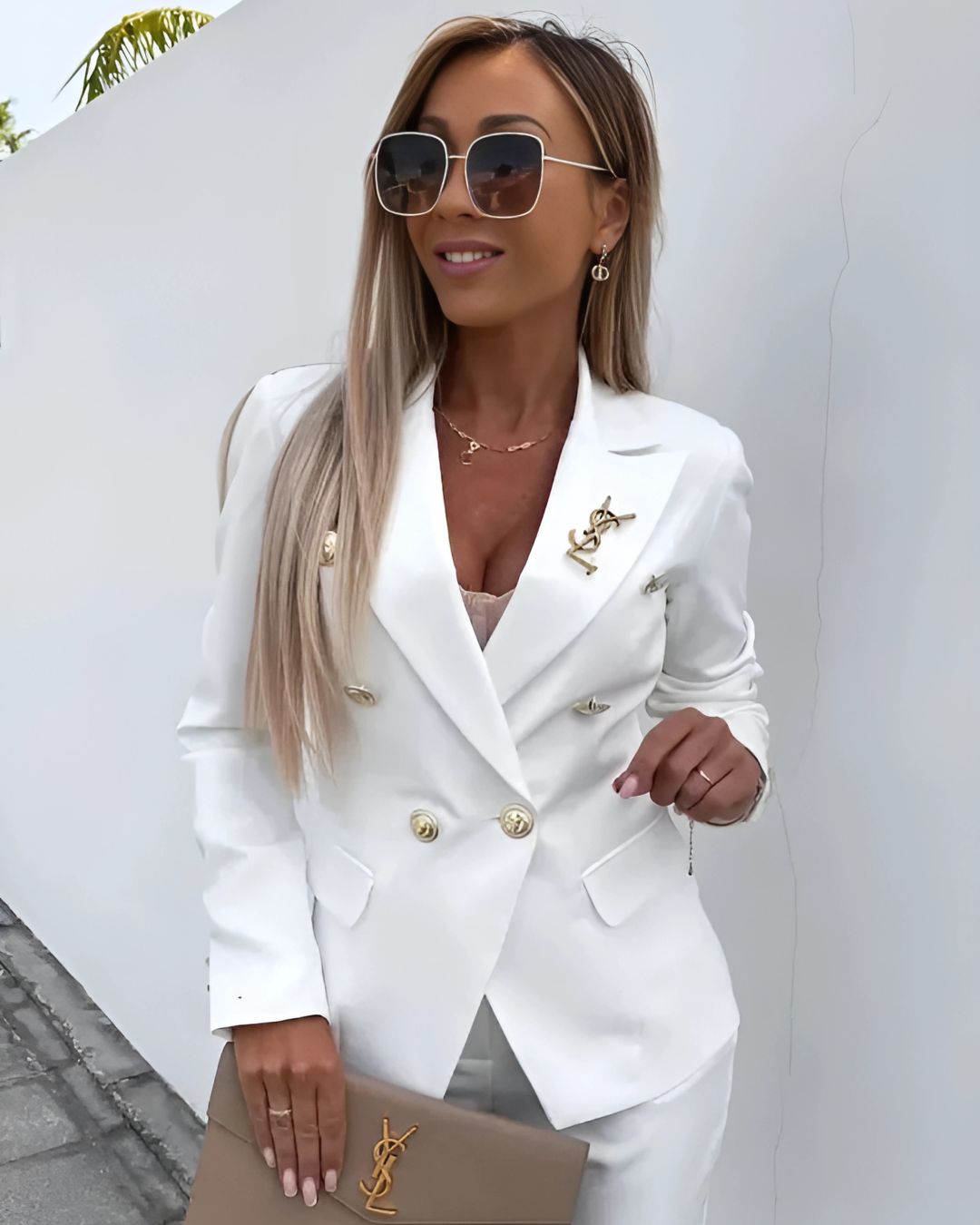 Tailored fit women's double-breasted suit, elegant & professional fashion for business attire.