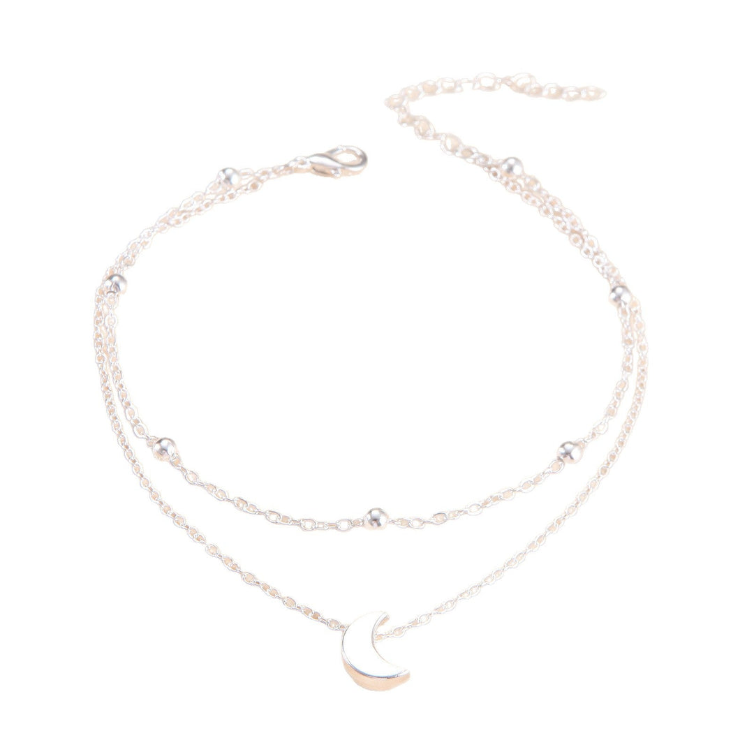 Silver & gold double-layered moon charm anklet for women, elegant celestial jewelry.