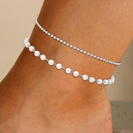 Gold tone double strand crystal beaded anklet for women, a sparkling summer accessory.