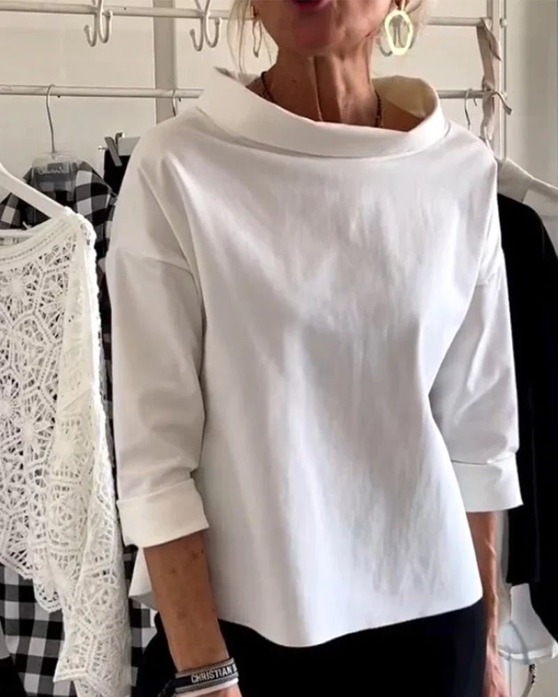 Women's draped cowl neck top with three-quarter sleeves & relaxed fit. Elegant & versatile for casual chic day to night.