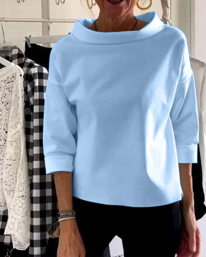 Blue women's draped cowl neck top, three-quarter sleeve & relaxed fit. Stylish and comfortable casual chic fashion.