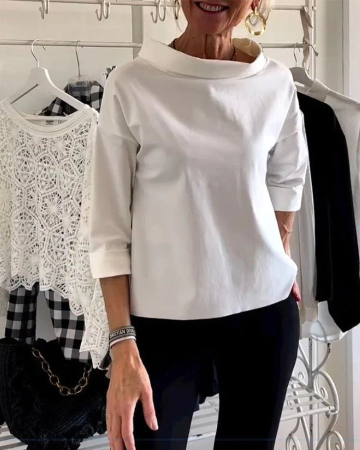 Elegant women's draped cowl neck top. Three-quarter sleeves & relaxed fit for a versatile, sophisticated look.