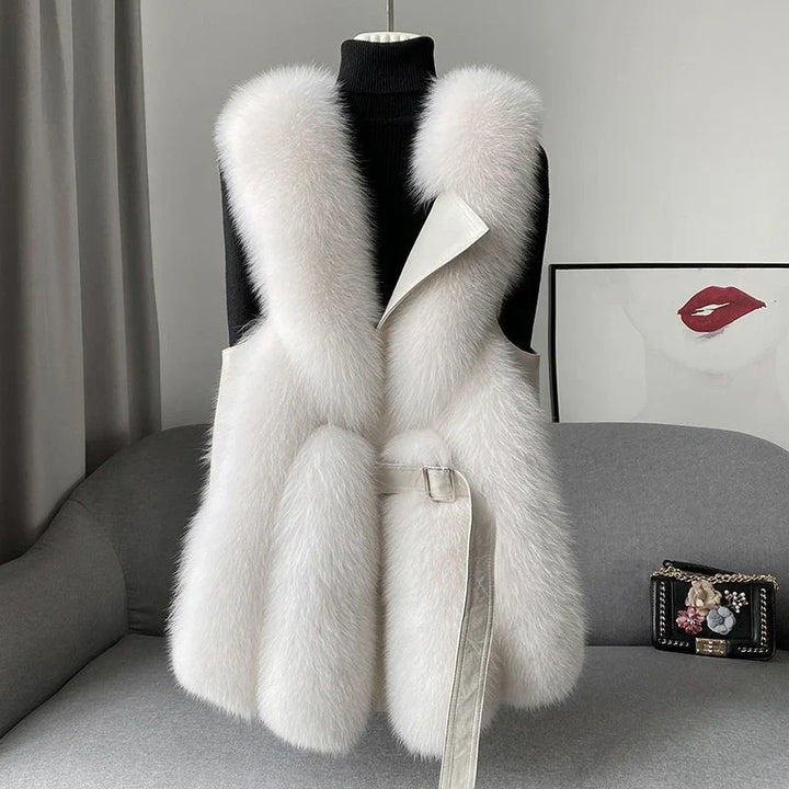 Women's dreamy fluffy waistcoat. Cozy, chic sleeveless vest for elegant winter layering and versatile fashion.