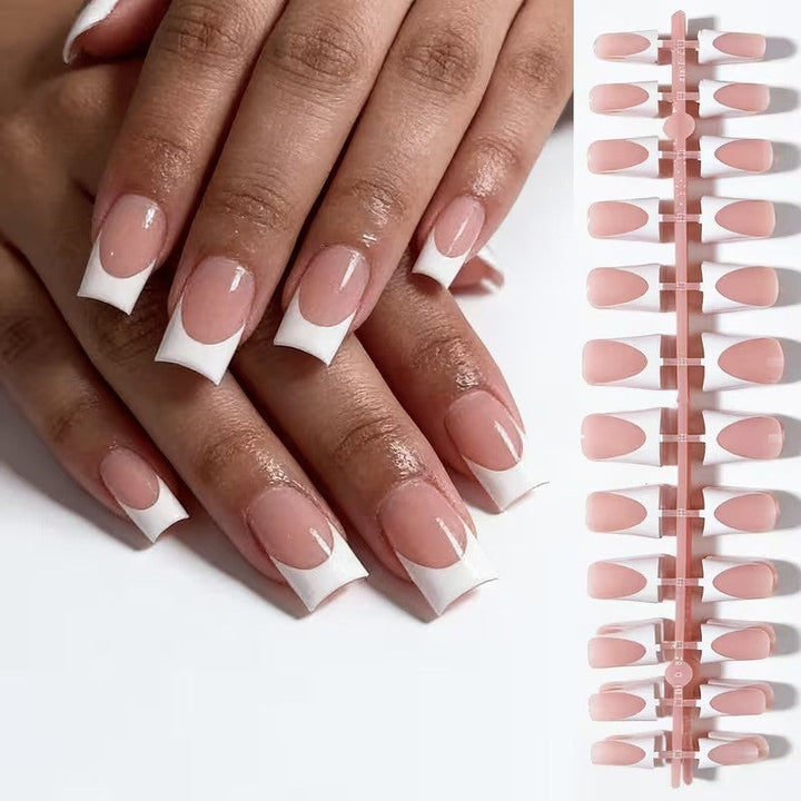 Flared duckbill artificial nail tips, clear wide press-on nails for unique salon manicure & fashionable nail art designs.