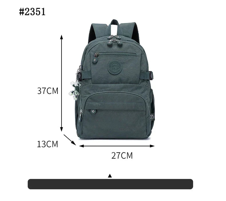 Close-up of the high-quality water-resistant nylon texture of the women's backpack.