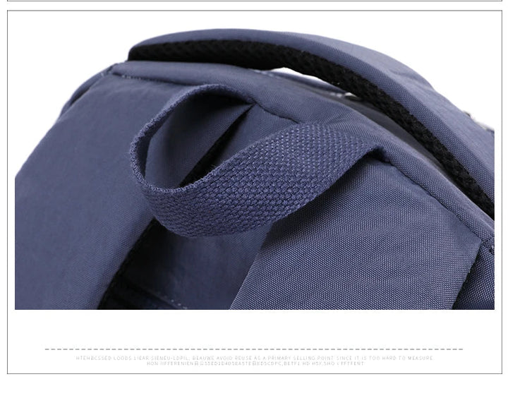 Elegant women's durable water-resistant nylon backpack, simple product shot.