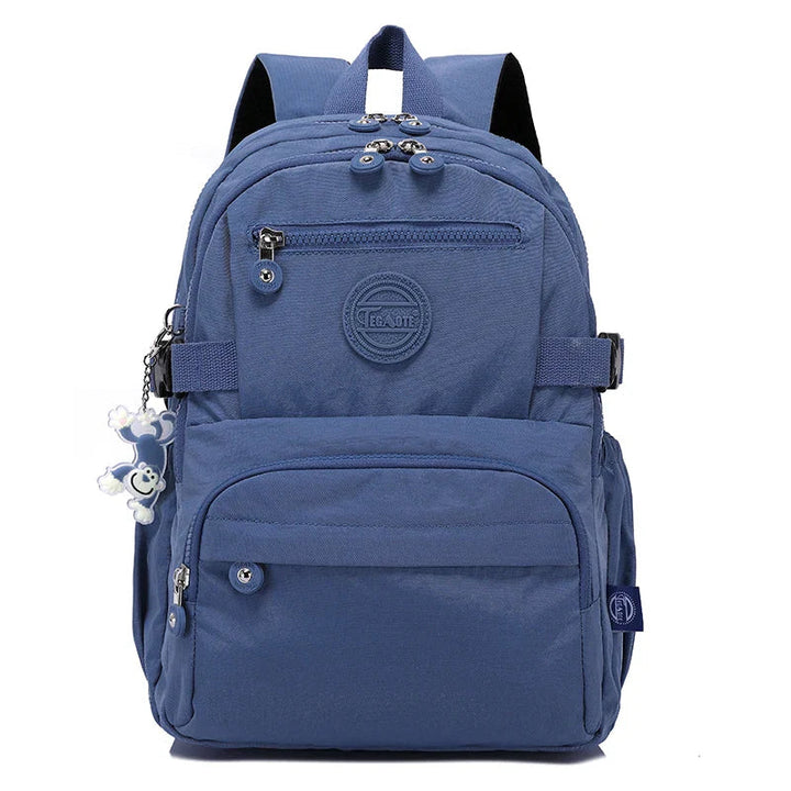 Women's school backpack made from water-resistant nylon, ready for books & essentials.