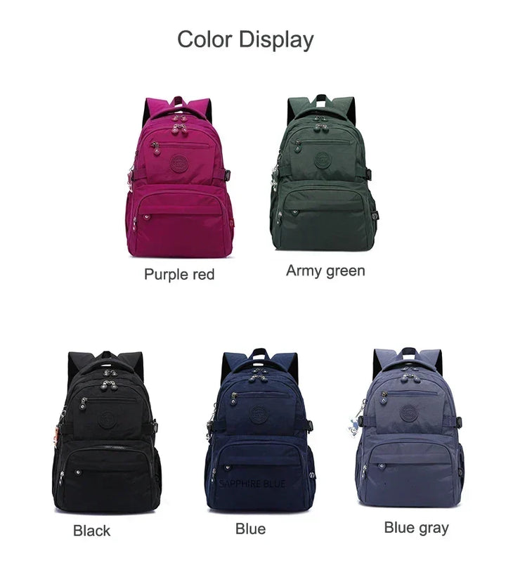 Water-resistant nylon women's travel backpack at an airport, ideal for stylish journeys.