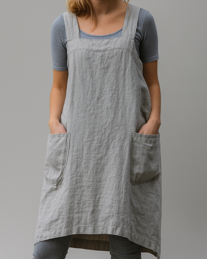 Easy-to-wear women's apron dress in a relaxed fit. Features useful pockets, great for casual summer style.