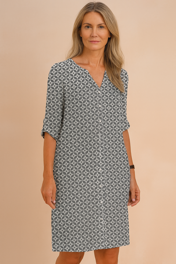 Effortless women's boho floral midi dress, a stylish loose-fit summer dress with V-neck, 3/4 sleeves.