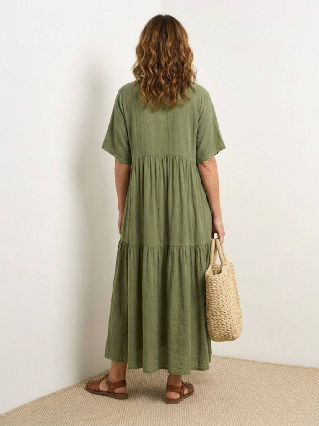 Lightweight women's tiered maxi dress. Ideal summer day dress with a V-neck style.