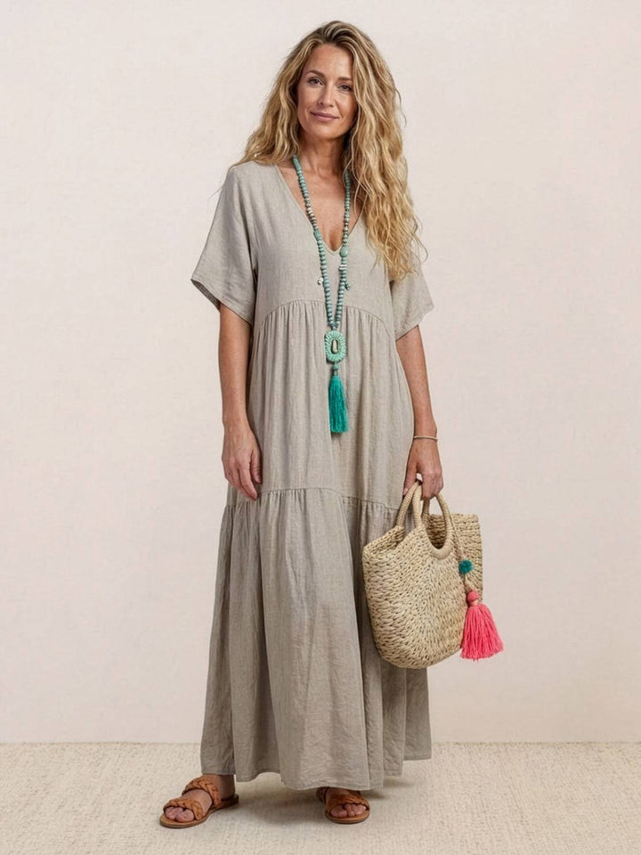 Women's comfortable V-neck boho maxi dress. Effortless tiered design for summer.