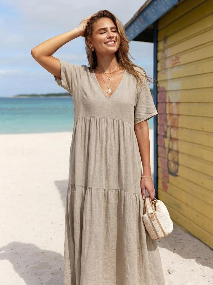 Boho-chic women's tiered maxi dress with a V-neck. Great for summer fashion.