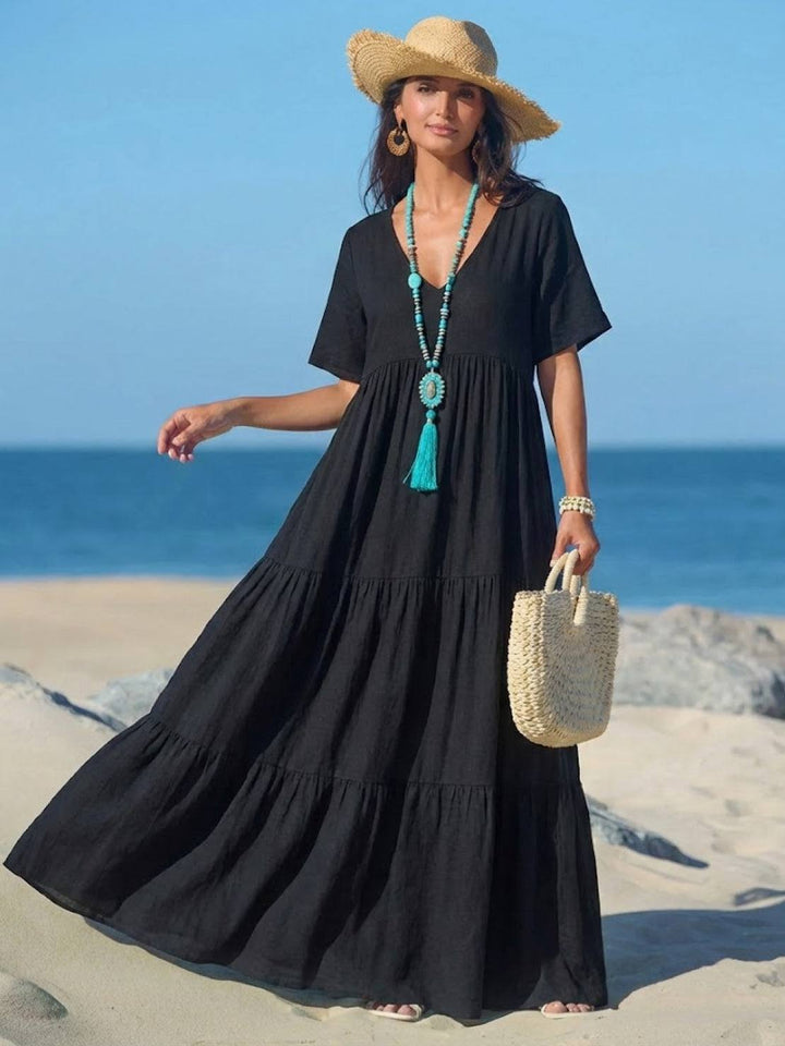 Day-to-night women's tiered maxi dress. Effortless V-neck boho style for summer.