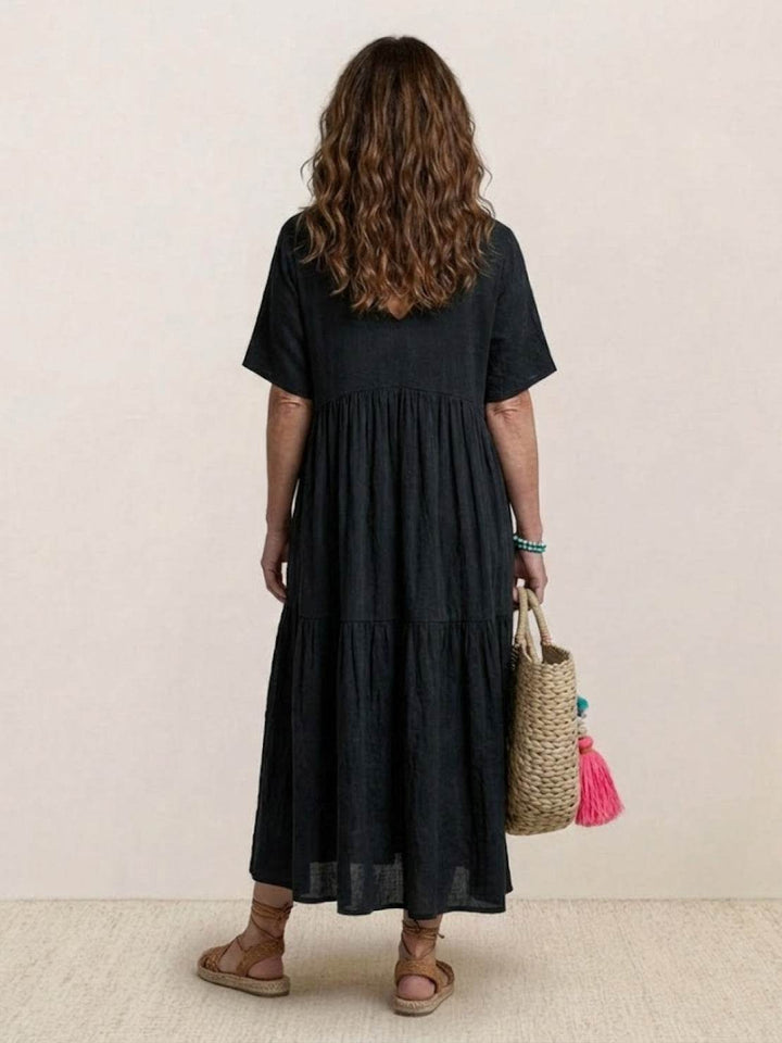 Stylish women's V-neck tiered maxi dress. A must-have boho piece for summer.