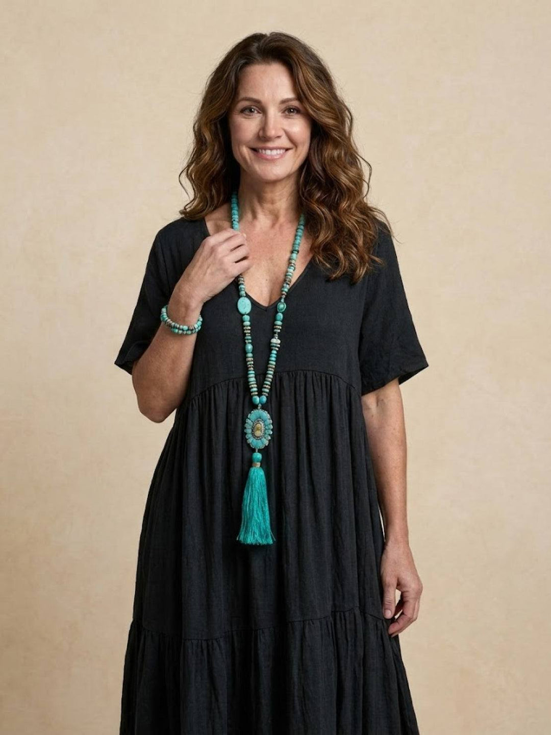 Comfortable women's flowy tiered maxi dress. Perfect V-neck design for warm weather.