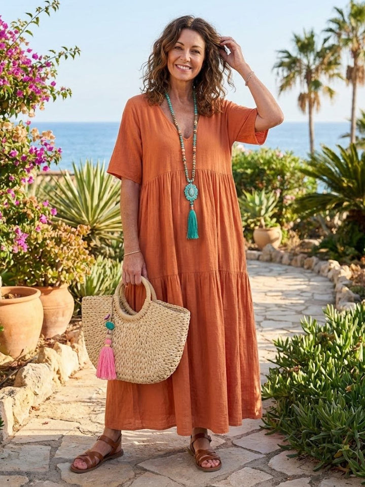 Casual women's boho maxi dress with a flattering V-neck and stylish tiers.