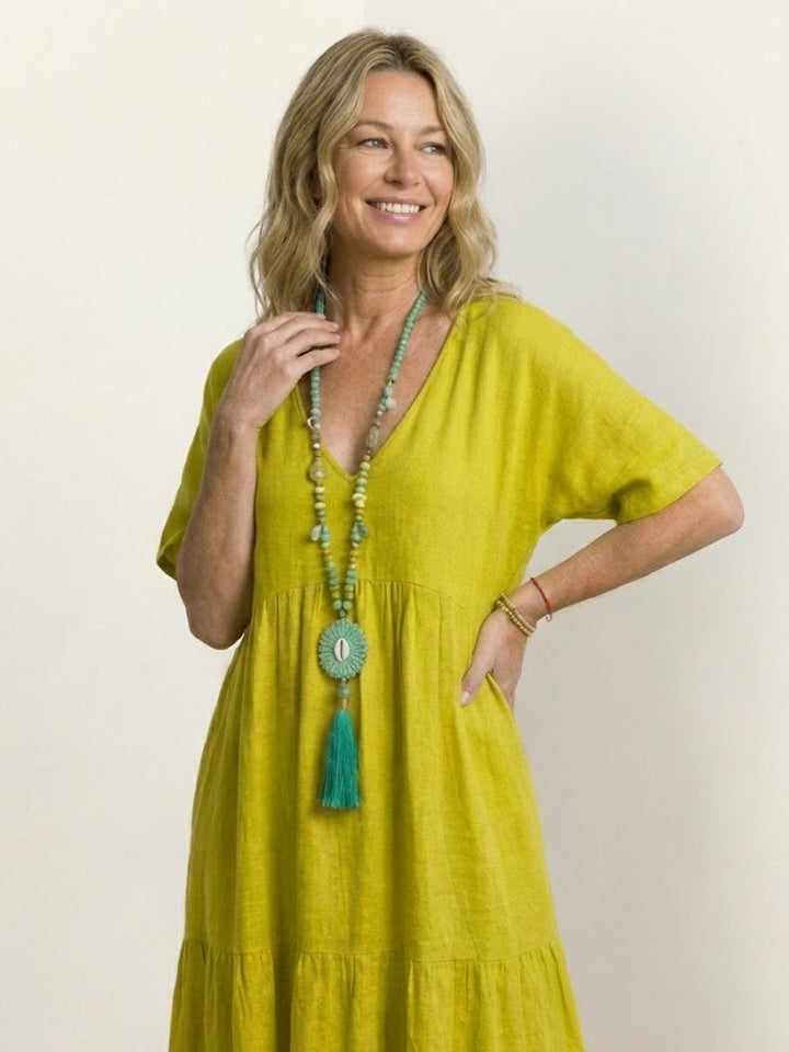 Vacation women's V-neck tiered maxi dress. Effortless boho style, beach perfect.