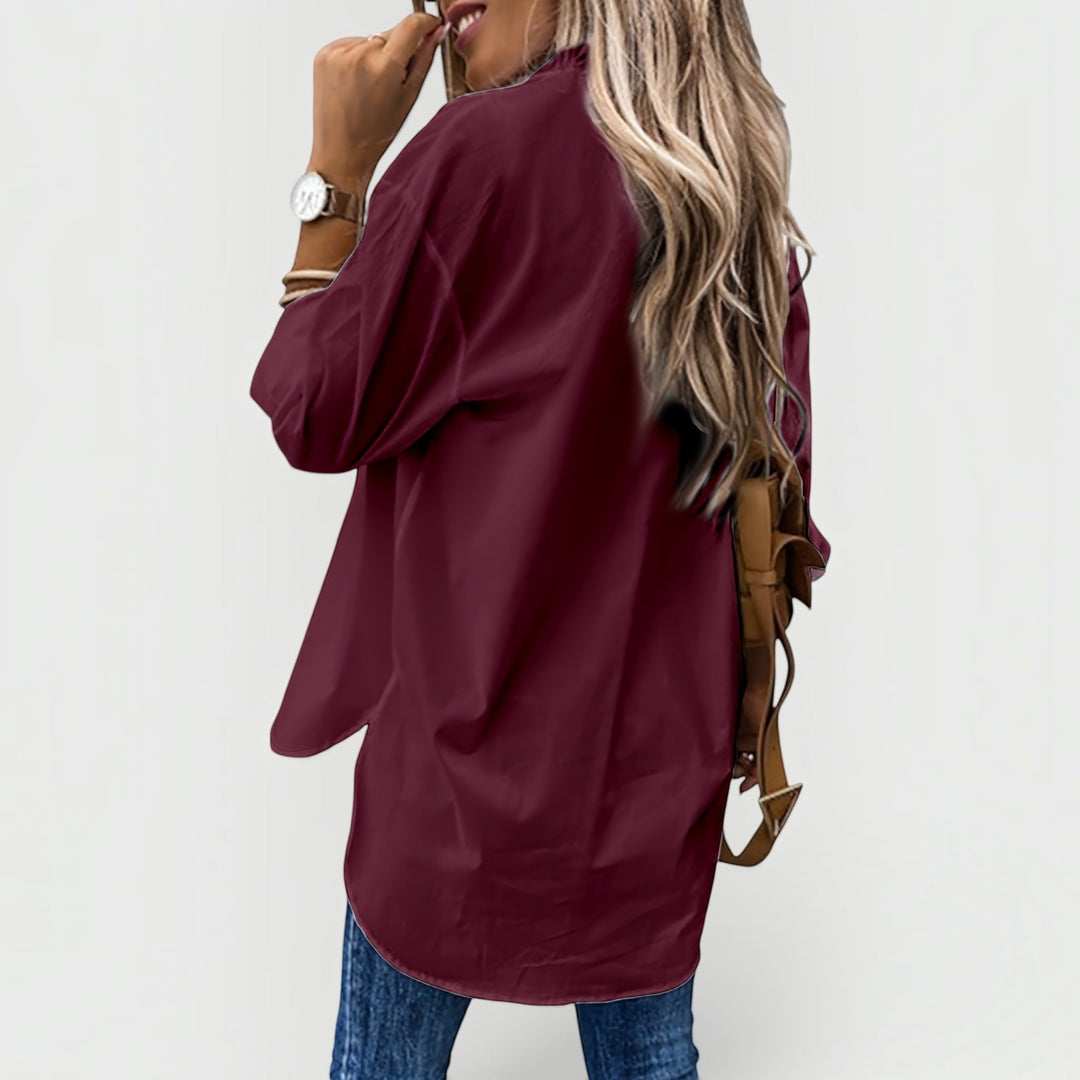Women's daily wear blouse, featuring a button-down front and comfortable long sleeves for fashion.