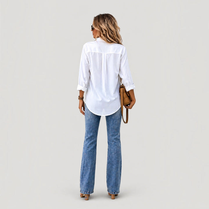 Stylish long-sleeve women's button blouse for casual outfits or chic workwear.