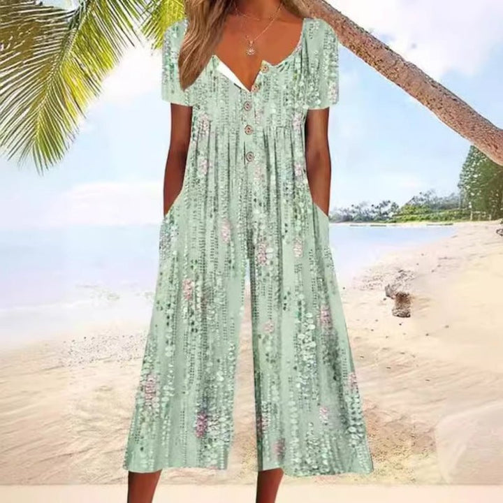 Comfortable V-neck button-front culotte jumpsuit for women, featuring short sleeves and a wide-leg for summer.