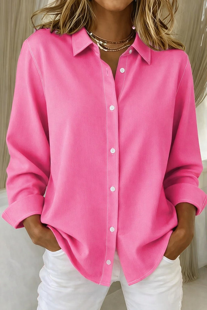 Women's effortless chic relaxed-fit long-sleeve button-down blouse in white, perfect for smart casual or workwear.