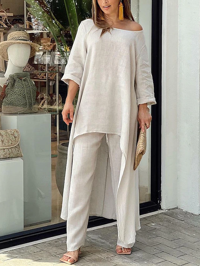 Stylish women's long-sleeve top and wide-leg pants two-piece ensemble. Perfect for relaxed weekend wear.