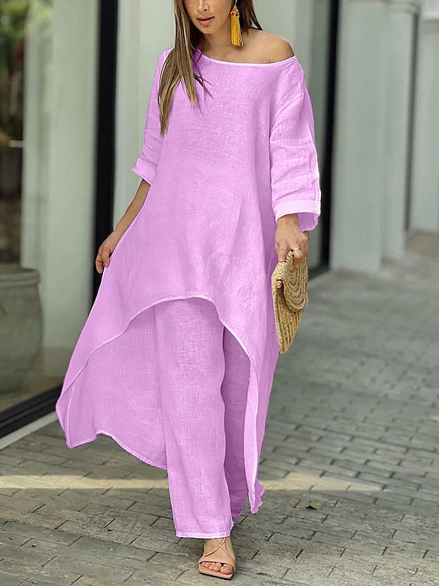 Effortless women's two-piece fashion set: a stylish long-sleeve top and comfy wide-leg pants.