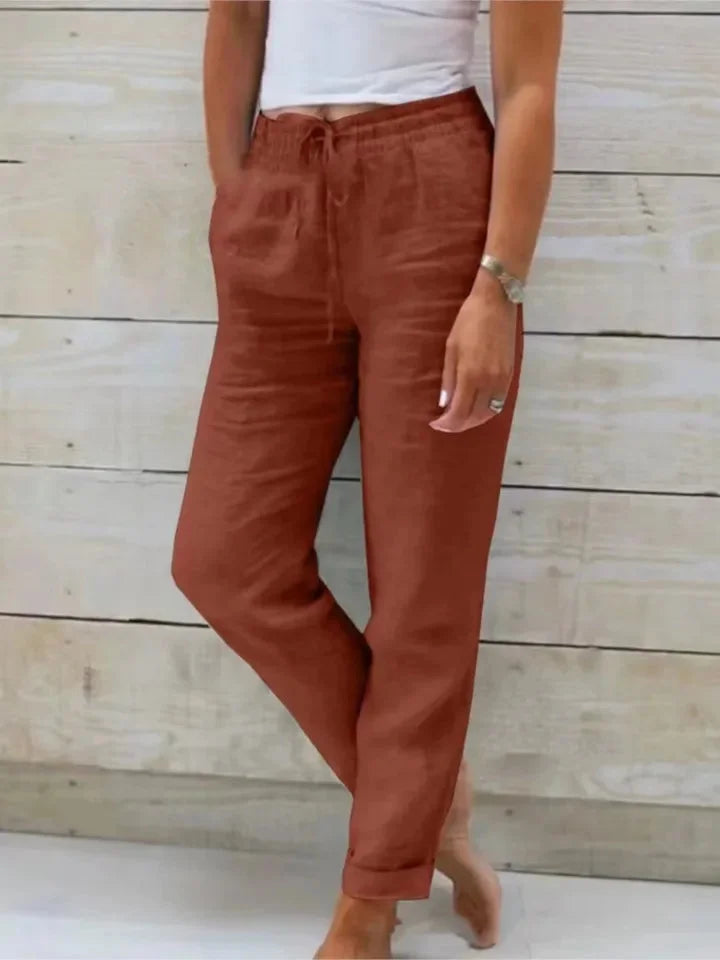 Relaxed fit women's casual pants, featuring an elastic cuff and adjustable drawstring for jogger style.