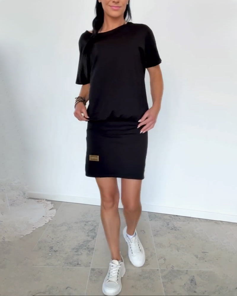 Effortless women's dress, combining casual comfort with elegant style. Flattering fit for modern women.