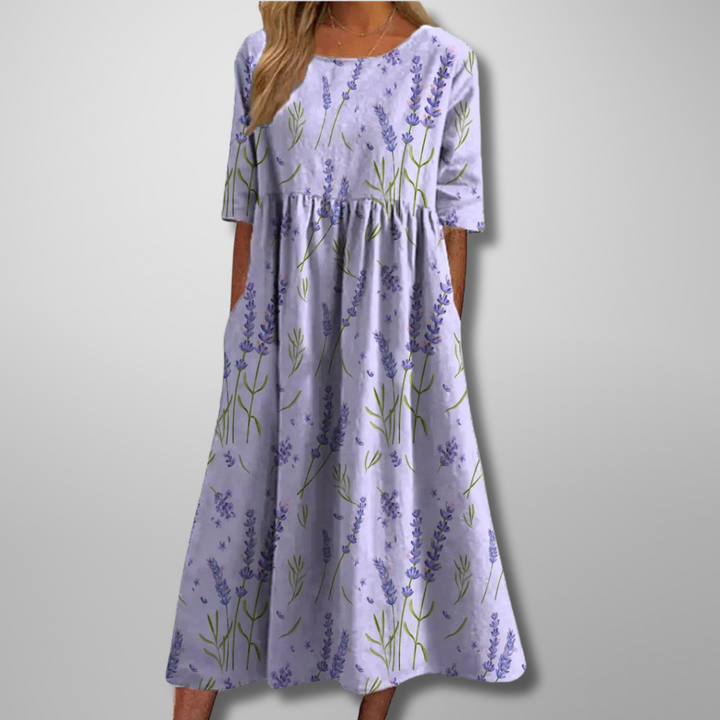 Casual long floral maxi dress for women, designed with an empire waist, 3/4 sleeves, and side pockets.