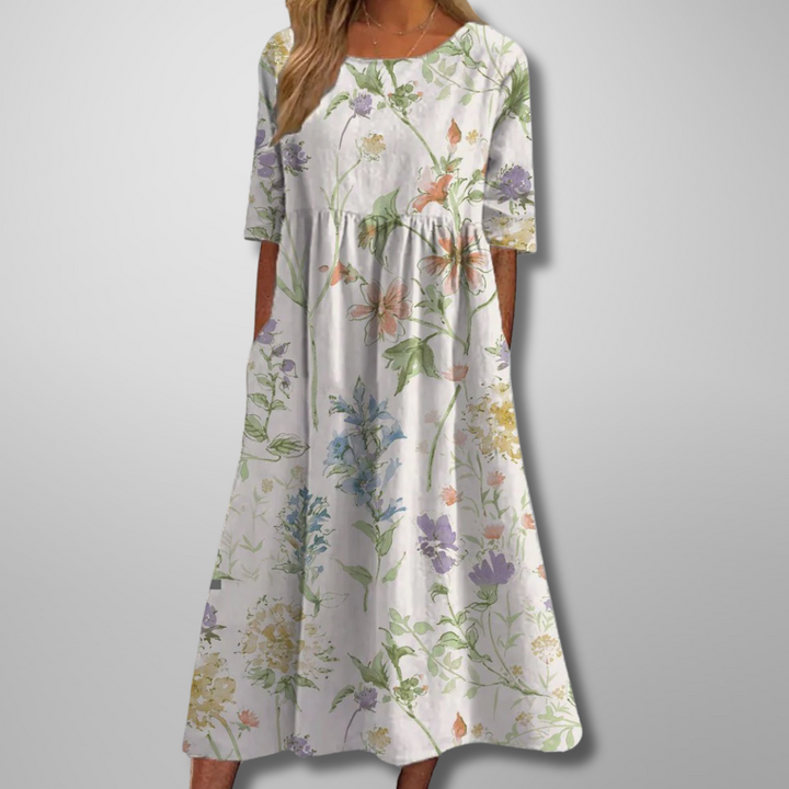 Summer-ready women's floral maxi dress, an effortless everyday wear option with a comfortable fit & pockets.