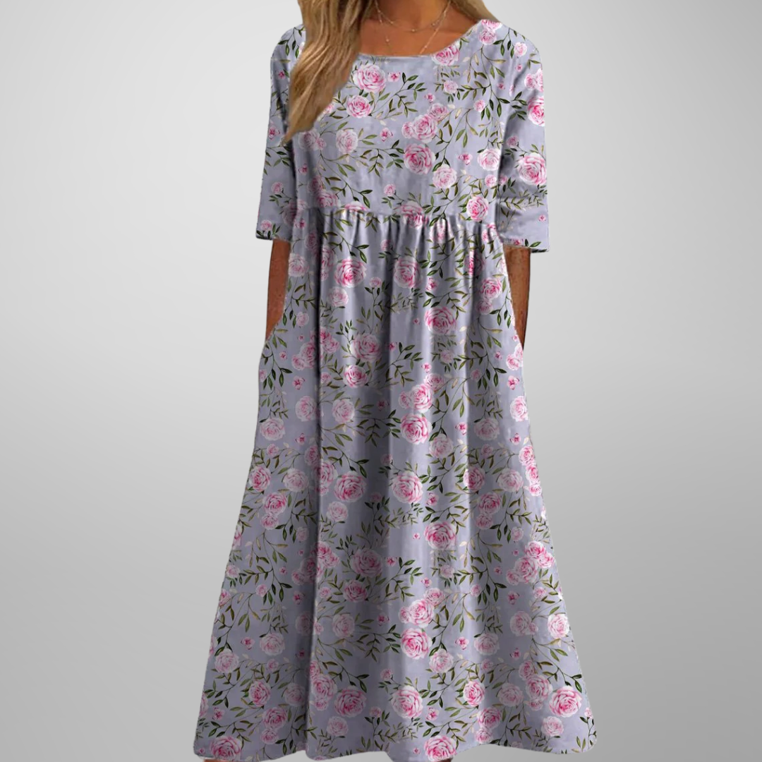 Women's versatile floral summer maxi dress, ideal for casual outings, featuring a relaxed fit & hidden pockets.