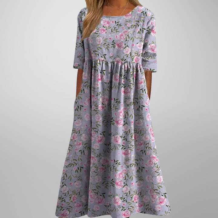 Women's versatile floral summer maxi dress, ideal for casual outings, featuring a relaxed fit & hidden pockets.