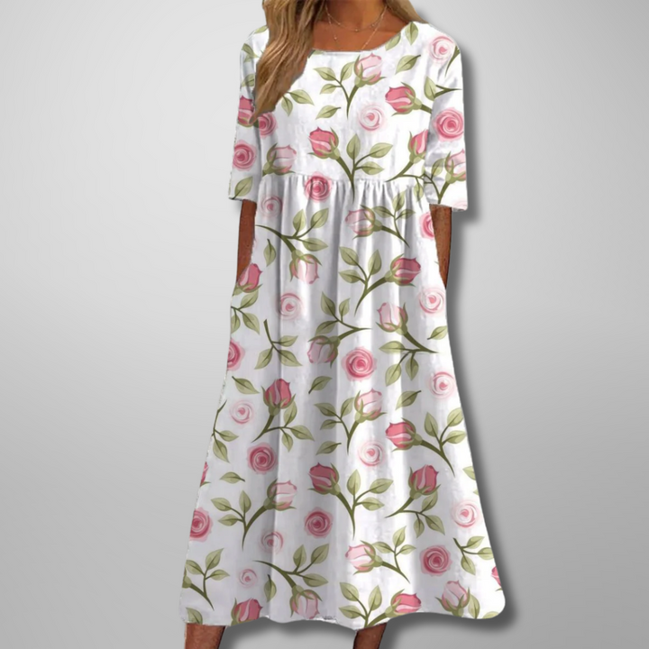 Full length view of a women's bohemian floral maxi dress, showcasing its flowy design and comfortable style.