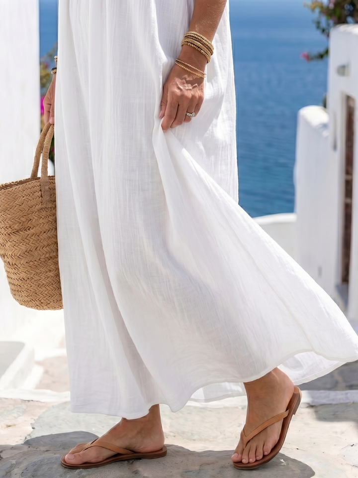 Elegant sleeveless summer maxi dress for women. Versatile casual flowy design for everyday fashion.