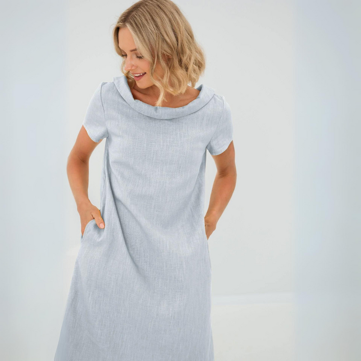 Women's short sleeve flowy linen midi summer dress, an effortless and elegant casual option.