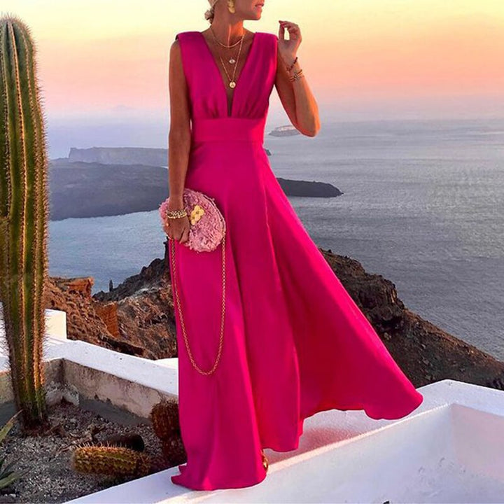 New women's flowy summer dress for ultimate comfort. This versatile sundress is elegant, casual, & perfect for any occasion.