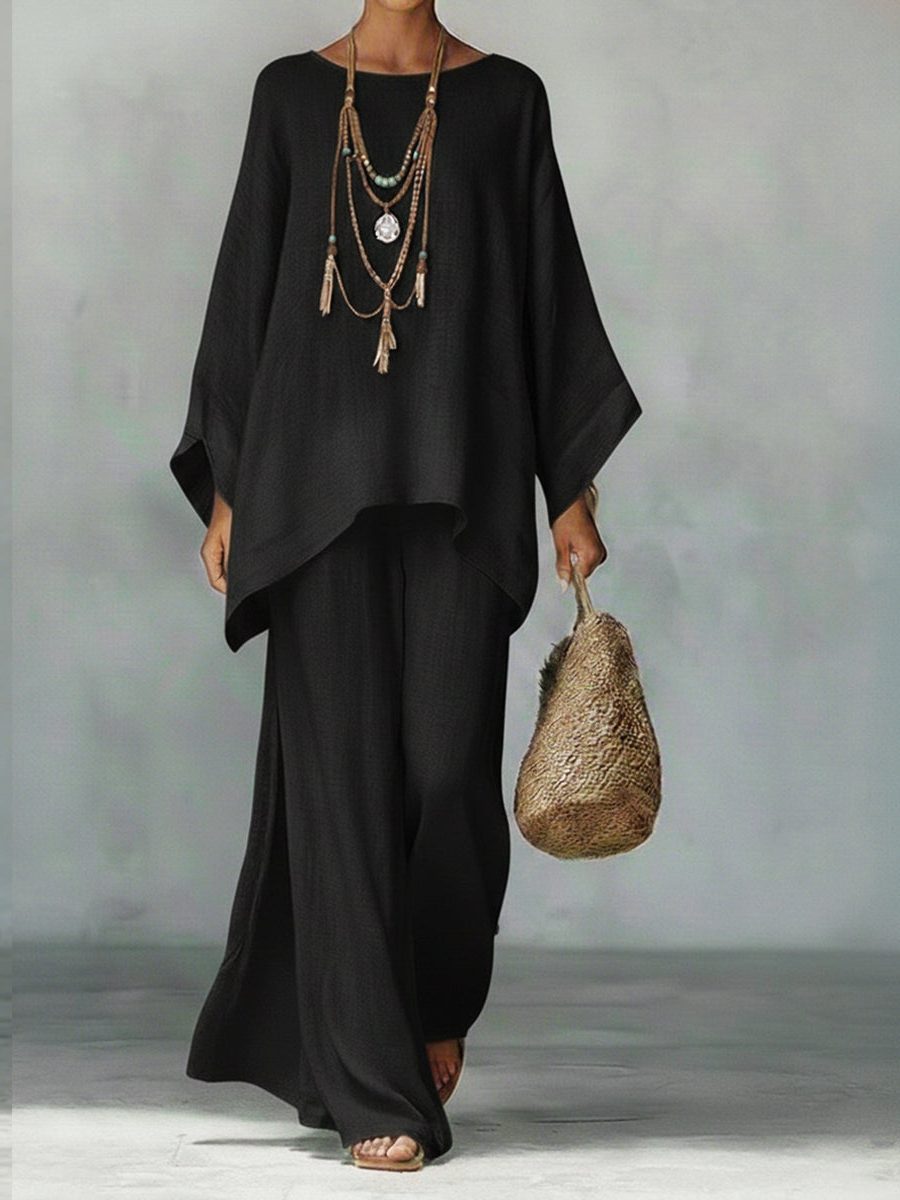 Versatile women's linen maxi two-piece set: stylish poncho top & straight leg trousers for beach or casual summer wear.