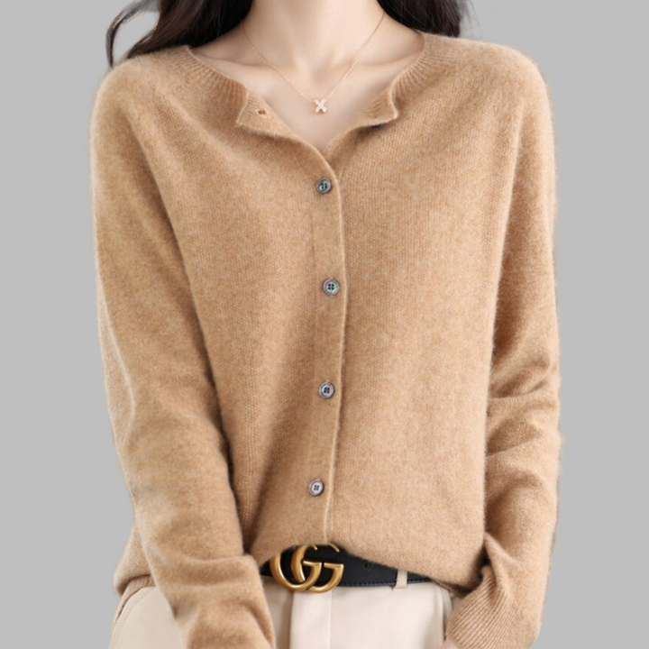 Women's O-Neck cardigan, soft cozy knit & long sleeves. Versatile layering piece for elegant fall & winter style.