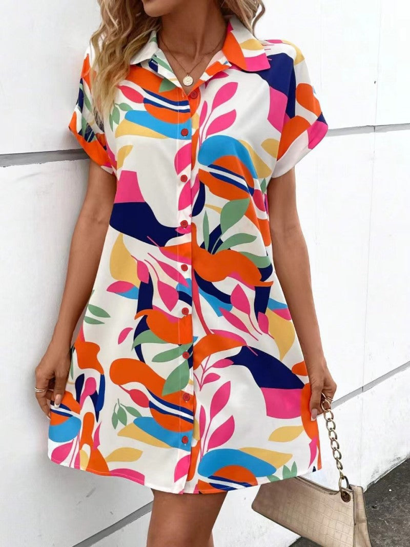 Effortless women's casual printed midi shirt dress. Stylish summer vacation wear with a comfortable relaxed fit.
