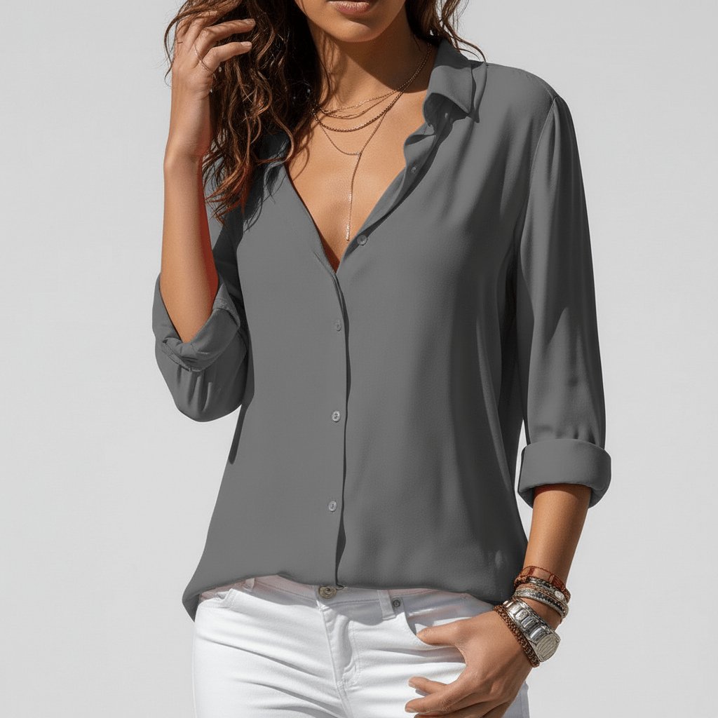 Women's effortless relaxed-fit button-up blouse, a stylish long sleeve smart casual top.