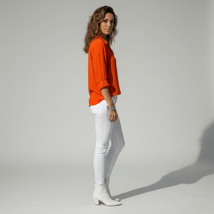 Stylish women's long sleeve blouse, relaxed-fit button-up perfect for smart casual fashion.