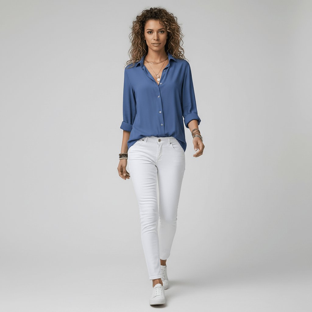 Elegant women's button-up blouse, relaxed-fit long sleeve perfect for smart casual style.