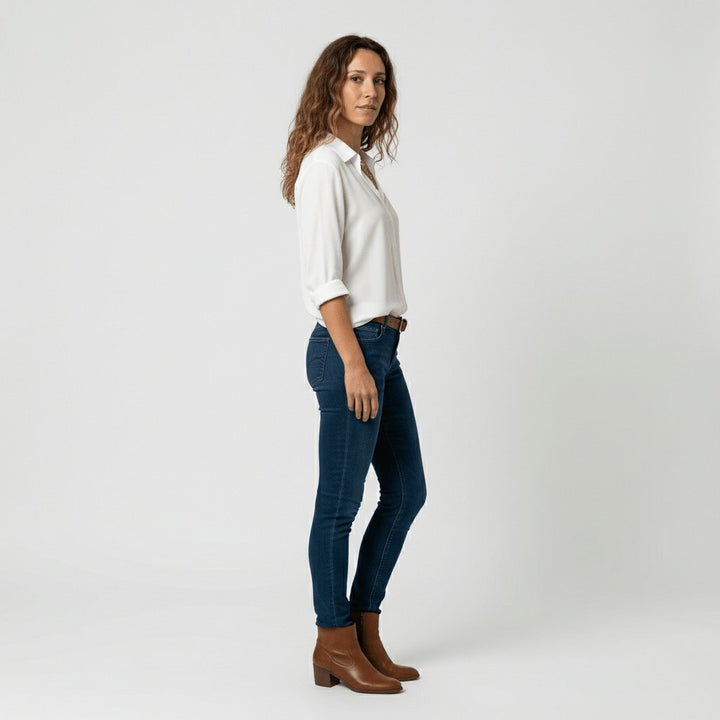 Fashionable women's relaxed-fit button-up blouse, a comfortable long sleeve versatile top.