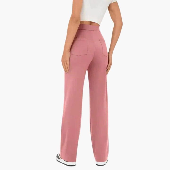 Women's relaxed fit pocket trousers, straight leg, elasticated waist, offering casual everyday comfort.